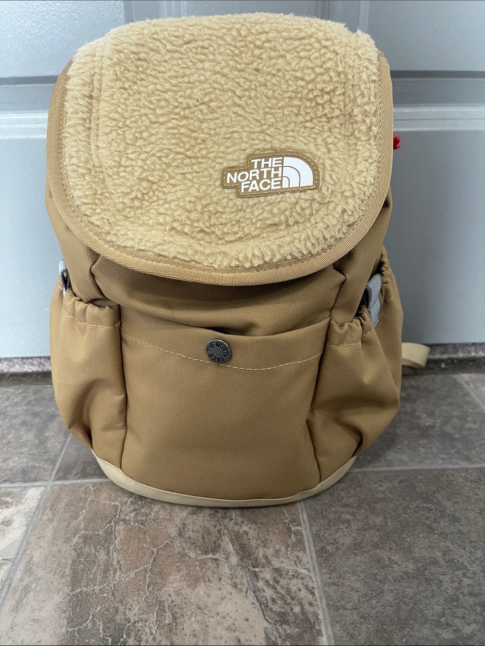 The North Face Tan Shearling-Trim Mini Backpack